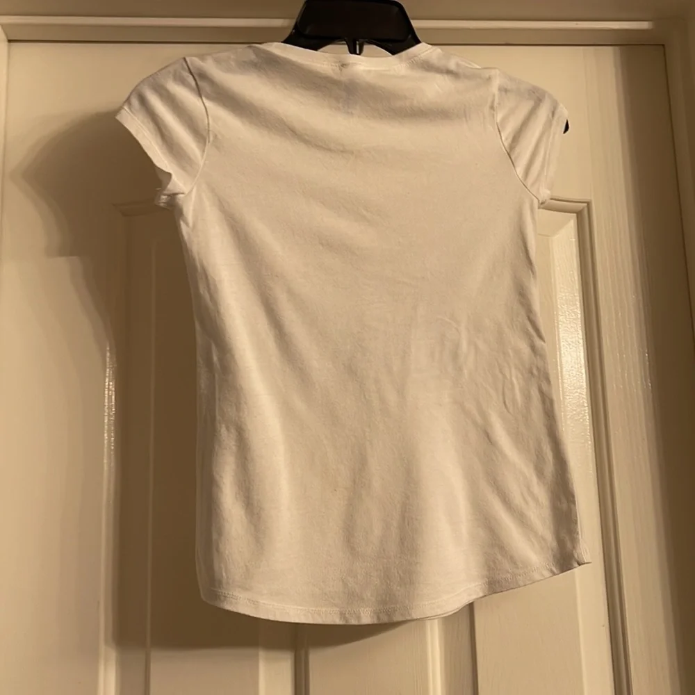 Justice T-shirt, size 8